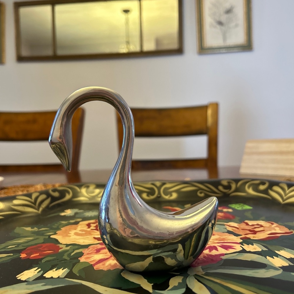 Metal vintage sculpted and numbered swan